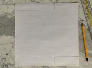 Step 3: Marking the four corners of a piece of paper